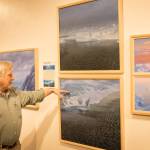 David Rosenthal describes work from his travels around the Arctic Ocean and through the Northwest Passage from his show, Painting at the Edge of the Ice Age, at the Pratt Museum & Park in Homer, Alaska. (Photo by Sean McDermott)
