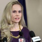 Alaska Department of Administration Commissioner Kelly Tshibaka addresses reporters in Anchorage, Alaska, on Sept. 26, 2019. Republican Tshibaka raised $673,383 last quarter, a total that included donations from a fundraiser at Trumps Mar-a-Lago resort in Florida, which Trump attended. As of March 31, 2022, Tshibaka had $967,600 cash on hand with just over $95,000 in debts. (AP Photo/Mark Thiessen, File)