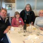 (From left) Mike Frost, Monica Frost, Tara Sweeney and Sue Carter attend a campaign meet and greet at Addie Camp on Saturday, April 16, 2022, in Soldotna, Alaska. Sweeney is running to fill the seat of former U.S. House Rep. Don Young, who died in March. (Photo courtesy Karina Waller)