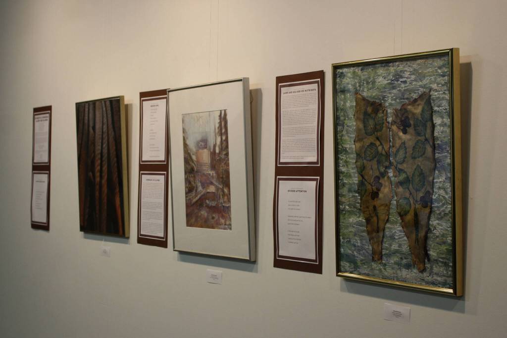 Art from Steve M. Schoonmaker is displayed as part of his show Symbiotic Symphony: Alders and Salmon at Cook Inletkeepers Community Action Studio on Friday, April 22, 2022, in Soldotna, Alaska. (Ashlyn OHara/Peninsula Clarion)