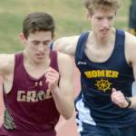 Homer's Seamus McDonough, right, starts the 600-meter event on Saturday, April 23, 2022, for the Homer Invite at Homer High School in Homer, Alaska. (Photo by Michael Armstrong/Homer News)
