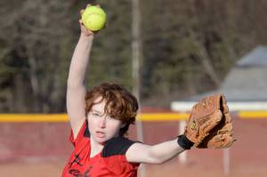 Kenai Central's Caitlin Crabb pitches to Soldotna on Monday, April 25, 2022, in Kenai, Alaska. (Photo by Jeff Helminiak/Peninsula Clarion)