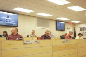 Members of the Kenai Peninsula Borough Assembly participate in a meeting on Tuesday, April 5, 2022, in Soldotna, Alaska. (Ashlyn OHara/Peninsula Clarion)
