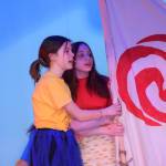 Aislyn Downum, left, and Mylee Yeoman perform a scene from Moana during a dress rehearsal at the Renee C. Henderson Auditorium in Kenai, Alaska, on Wednesday, April 27, 2022. (Camille Botello/Peninsula Clarion)