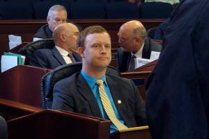 Alaska state Rep. David Eastman, a Wasilla Republican, is shown seated on the House floor on Friday, April 29, 2022, in Juneau, Alaska. Minority House Republicans removed Eastman from their caucus, with the minority leader citing a buildup of issues over time. (AP Photo/Becky Bohrer)
