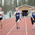 Soldotnas Gracie Bras, between Kenai Centrals Malena Grieme and Tri-Valleys McKinley Eddington, wins the 100 meters on Saturday, April 30, 2022, at the SoHi Invitational at Soldotna High School in Soldotna, Alaska. Grieme finished third. (Photo by Jeff Helminiak/Peninsula Clarion)