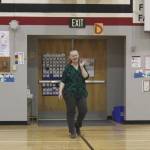 Sterling Elementary School Principal Denise Kelly walks into a surprise assembly to celebrate her being named Alaska Elementary Principal of the Year at Sterling Elementary School on Monday, May 2, 2022, in Sterling, Alaska. (Ashlyn OHara/Peninsula Clarion)