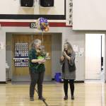 From left: Jennifer Schmitz, Denise Kelly, Jennifer Rinaldi and Clayton Holland attend a surprise assembly at Sterling Elementary School held to celebrate Kelly being named Alaska Elementary Principal of the Year, on Monday, May 2, 2022, in Sterling, Alaska. (Ashlyn OHara/Peninsula Clarion)