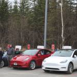 Tesla owners charge their vehicles at Alaskas first Tesla Supercharger station on Saturday, April 30, 2022,</span> in Soldotna, Alaska. (Ashlyn OHara/Peninsula Clarion)
