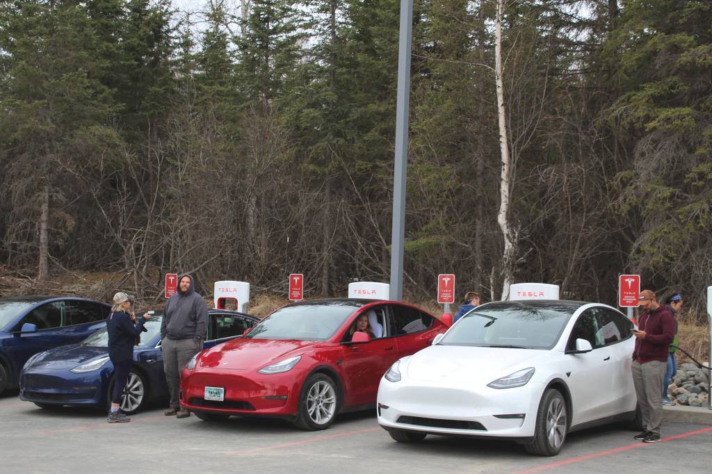Tesla owners charge their vehicles at Alaskas first Tesla Supercharger station on Saturday, April 30, 2022,</span> in Soldotna, Alaska. (Ashlyn OHara/Peninsula Clarion)