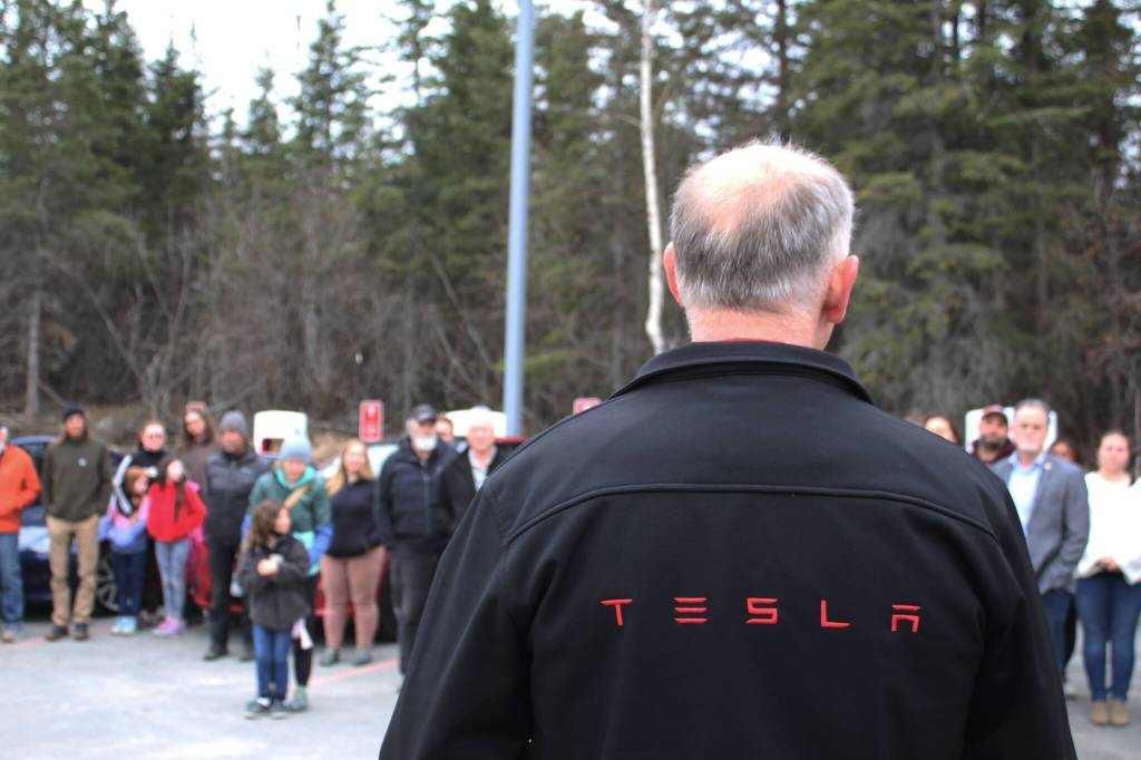 Dr. Henry Krull addresses attendees at a ribbon cutting ceremony for Alaskas first Tesla Supercharger station on Saturday, April 30, 2022, in Soldotna, Alaska. (Ashlyn OHara/Peninsula Clarion)