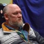 Henry Burns, principal of Seward High School, works in his office in in Seward, Alaska on Tuesday, May 3, 2022. (Camille Botello/Peninsula Clarion)