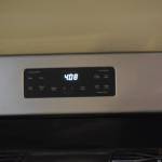 The clock on Christina Burns oven reads 4:08 a.m. in Anchorage, Alaska on Tuesday, May 3, 2022. (Camille Botello/Peninsula Clarion)