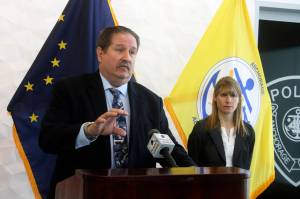 Anchorage Police Det. Dave Cordie, left, addresses reporters Thursday, May 5, 2022, in Anchorage, Alaska, about the disappearance nine years ago of a 6-year-old boy and hopes that the public will provide new leads on the whereabouts of Deshawn McCormick. On the right is attorney Rachel Gernat with the Office of Special Prosecutions, which provides legal assistance to the police on cold cases. (AP Photo/Mark Thiessen)