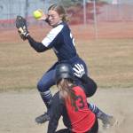 Soldotna second baseman Emily Hinz forces out Kenais Avery Ellis at second base Saturday, May 7, 2022, at Steve Shearer Memorial Ball Field in Kenai, Alaska. (Photo by Jeff Helminiak/Peninsula Clarion)