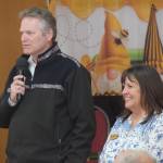Alaska Gov. Mike Dunleavy speaks at the Soldotna Senior Center with Executive Director Loretta Knudson-Spalding on Friday, May 6, 2022. (Camille Botello/Peninsula Clarion)