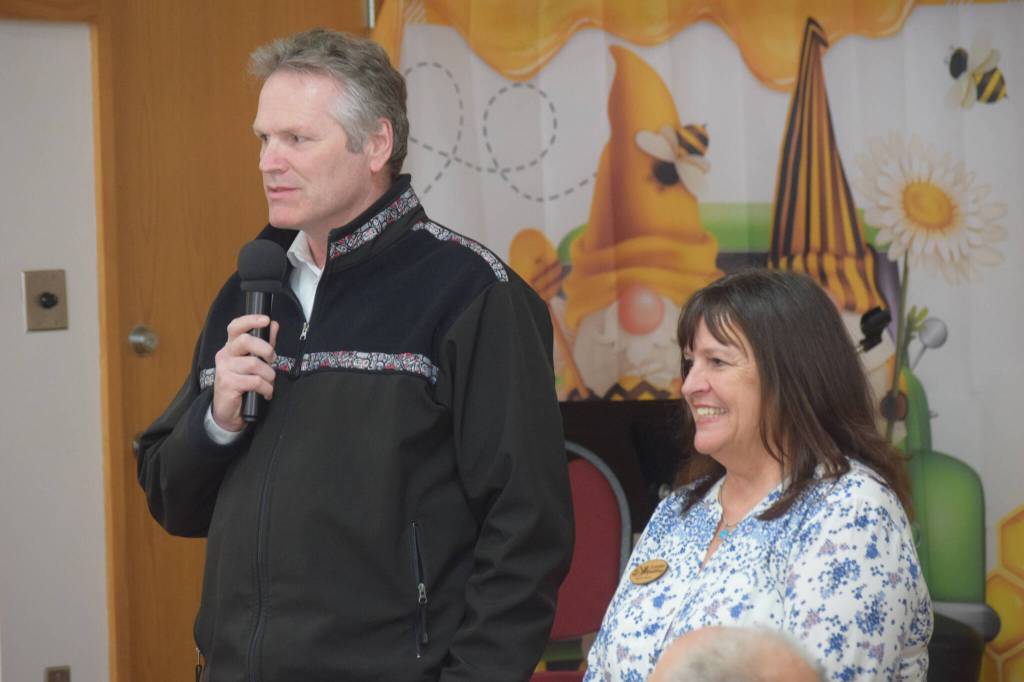 Alaska Gov. Mike Dunleavy speaks at the Soldotna Senior Center with Executive Director Loretta Knudson-Spalding on Friday, May 6, 2022. (Camille Botello/Peninsula Clarion)