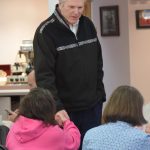 Alaska Gov. Mike Dunleavy attends a Meals on Wheels event at the Soldotna Senior Center on Friday, May 6, 2022. (Camille Botello/Peninsula Clarion)