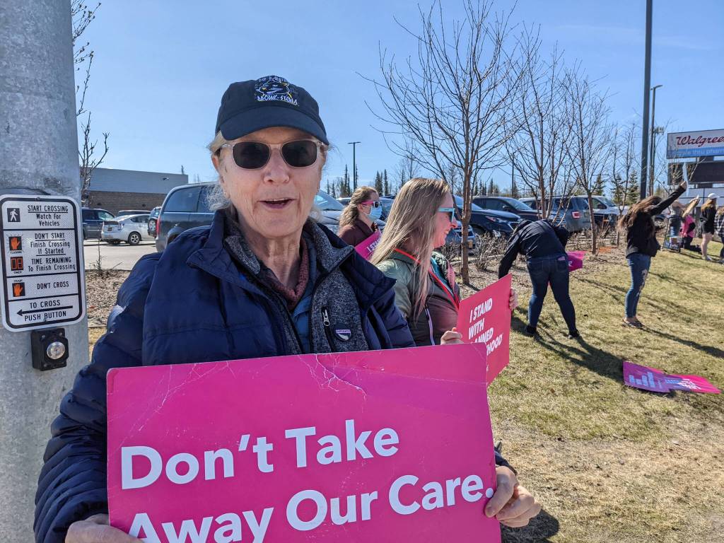 Pamela Lloyd, of Sterling, holds a sign in support of abortion rights at the intersection of the Kenai Spur and Sterling highways on Saturday, May 7, 2022, in Soldotna, Alaska. (Photo by Erin Thompson/Peninsula Clarion)