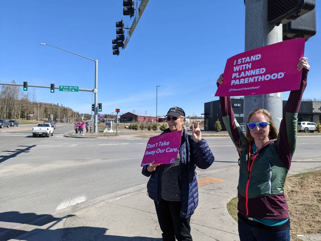 Demonstrators in support of abortion rights stand at the intersection of the Kenai and Sterling highways on Saturday, May 7, 2022, in Soldotna, Alaska. (Photo by Erin Thompson/Peninsula Clarion)