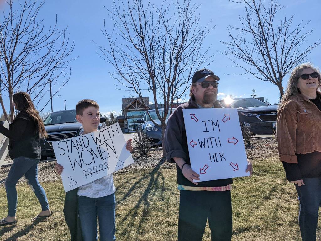Demonstrators in support of abortion rights stand at the intersection of the Kenai and Sterling highways on Saturday, May 7, 2022, in Soldotna, Alaska. (Photo by Erin Thompson/Peninsula Clarion)