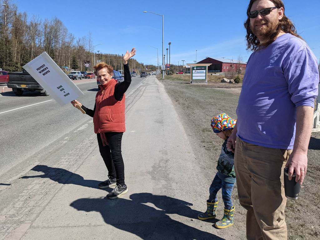 Demonstrators in support of abortion rights stand at the intersection of the Kenai and Sterling highways on Saturday, May 7, 2022, in Soldotna, Alaska. (Photo by Erin Thompson/Peninsula Clarion)