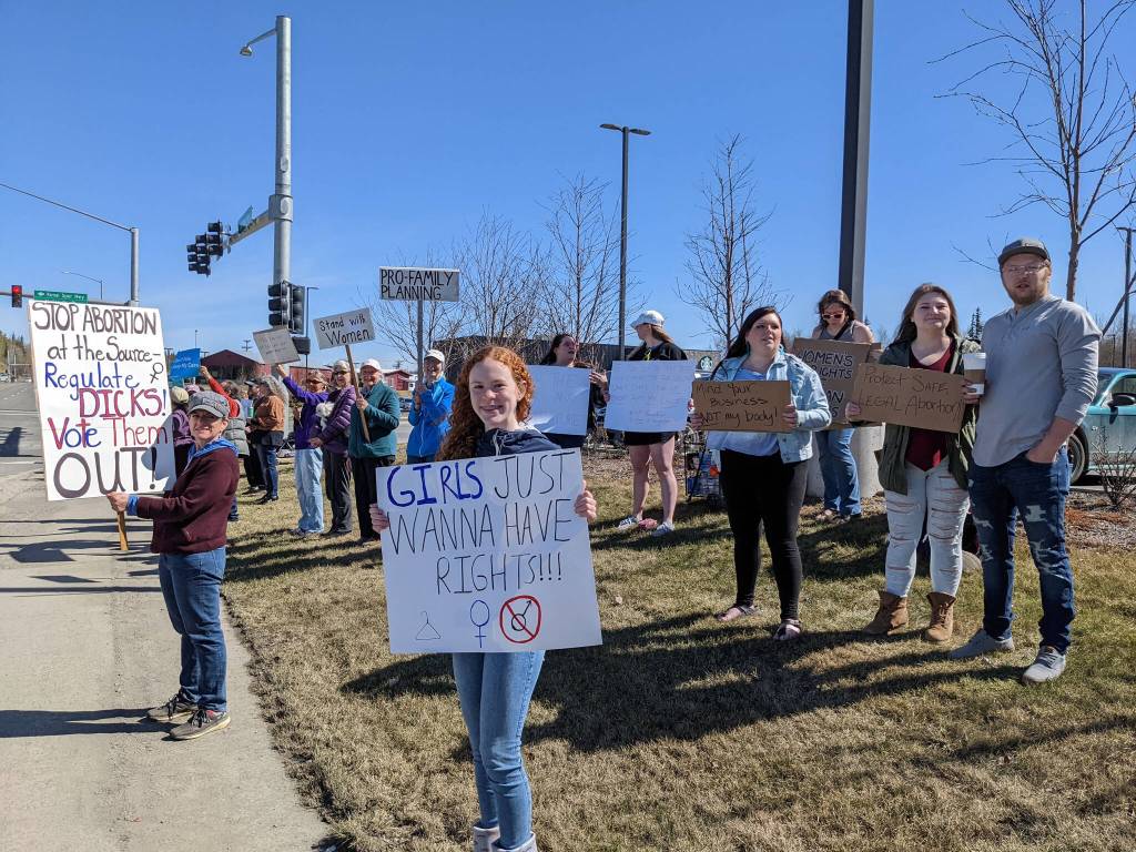 Demonstrators in support of abortion rights stand at the intersection of the Kenai and Sterling highways on Saturday, May 7, 2022, in Soldotna, Alaska. (Photo by Erin Thompson/Peninsula Clarion)