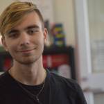 Riley Updike works at My Alaskan Gifts in the Kenai Municipal Airport on Wednesday, May 11, 2022. (Camille Botello/Peninsula Clarion)