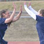 Soldotna's Katharine Bramante and Liberty Miller celebrate Miller's goal against Houston on Thursday, May 12, 2022, at Justin Maile Field at Soldotna High School in Soldotna, Alaska. (Photo by Jeff Helminiak/Peninsula Clarion)