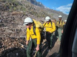 The Alaska Division of Forestrys White Mountain crew responds to a fire burning near Milepost 46.5 of the Sterling Highway on Tuesday, May 10, 2022, near Cooper Landing, Alaska. (Photo courtesy Cooper Landing Emergency Services)