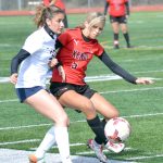 Soldotnas Zayra Poage and Kenai Centrals Chloe Goldsby battle for the ball Friday, May 13, 2022, at Ed Hollier Field at Kenai Central High School in Kenai, Alaska. (Photo by Jeff Helminiak/Peninsula Clarion)