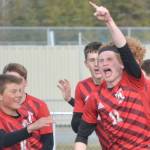 Kenai Central's Wade James celebrates his first-half goal against Soldotna on Friday, May 13, 2022, at Ed Hollier Field at Kenai Central High School in Kenai, Alaska. (Photo by Jeff Helminiak/Peninsula Clarion)
