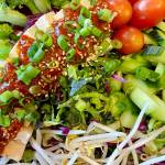 Gochujang dressing spices up tofu, lettuce, veggies and sprouts. (Photo by Tressa Dale/Peninsula Clarion)