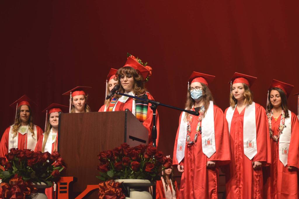 Andrea Cordero (center) speaks as one of Kenai Central High Schools valedictorians during the schools graduation ceremony on Tuesday, May 17, 2022, in Kenai, Alaska. (Ashlyn OHara/Peninsula Clarion)