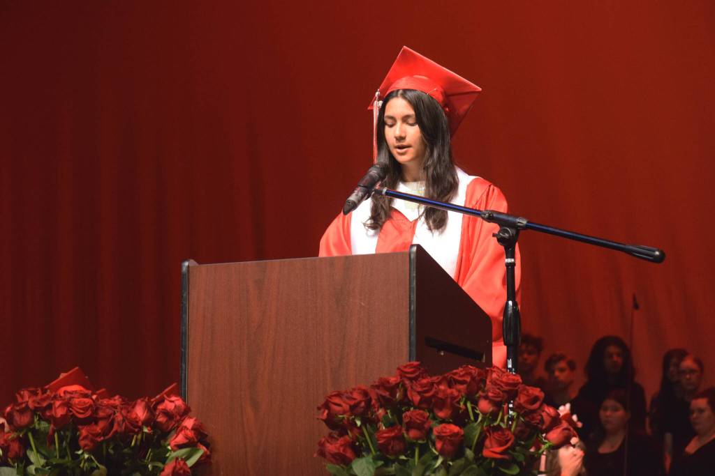 Kenai Central High School graduate Julianna Hamilton provides opening remarks at the schools commencement ceremony on Tuesday, May 17, 2022, in Kenai, Alaska. (Ashlyn OHara/Peninsula Clarion)
