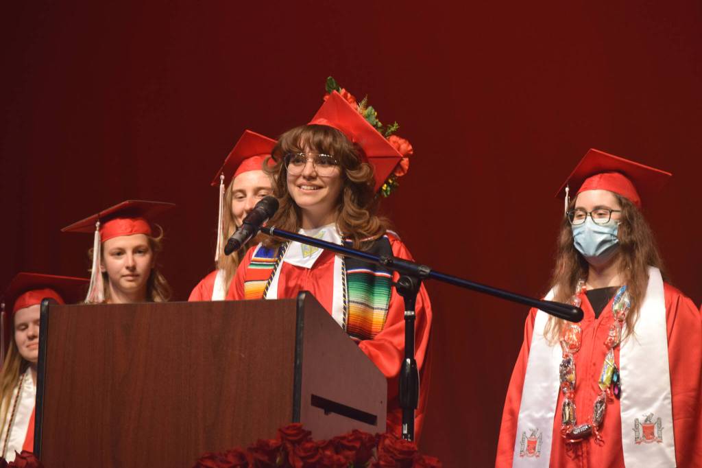 Andrea Cordero (center) speaks as one of Kenai Central High Schools valedictorians during the schools graduation ceremony on Tuesday, May 17, 2022, in Kenai, Alaska. (Ashlyn OHara/Peninsula Clarion)