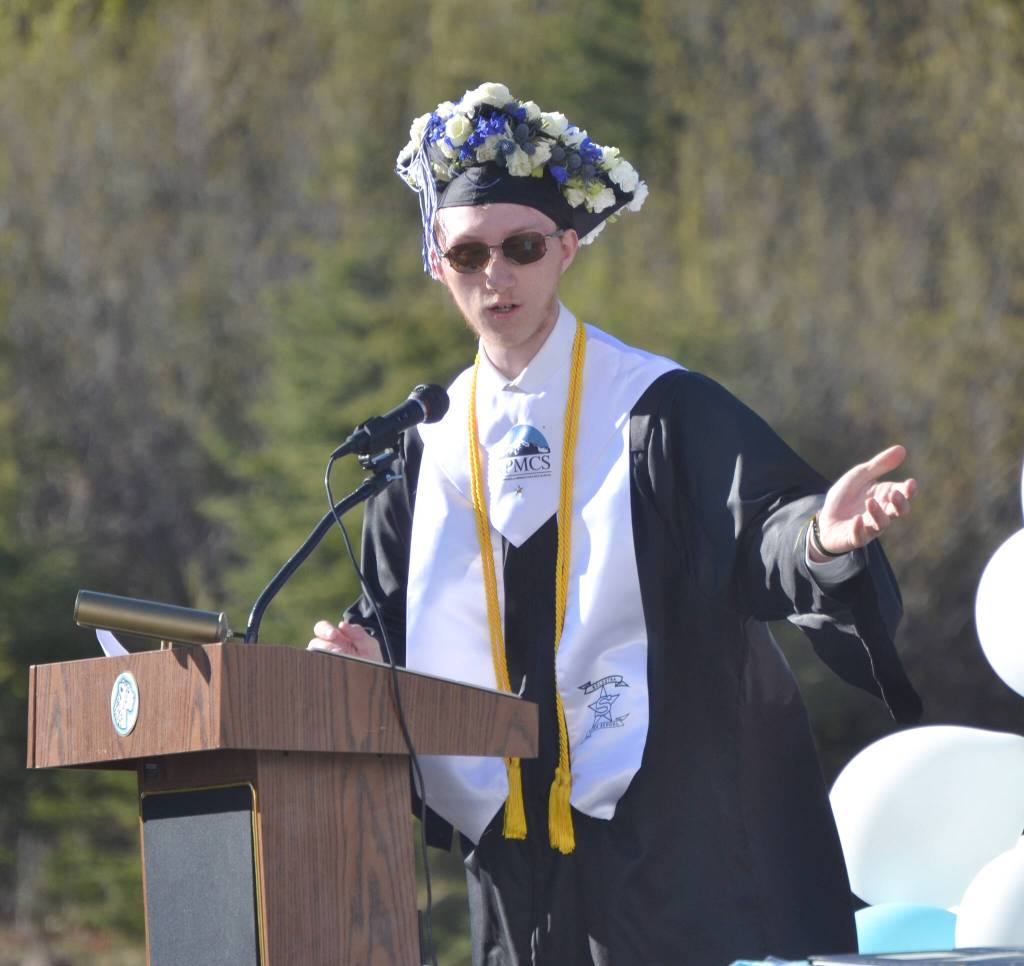 Justin Hansen, salutatorian at River City Academy, speaks at graduation ceremonies Tuesday, May 17, 2022, at Skyview Middle School just outside of Soldotna, Alaska. (Photo by Jeff Helminiak/Peninsula Clarion)