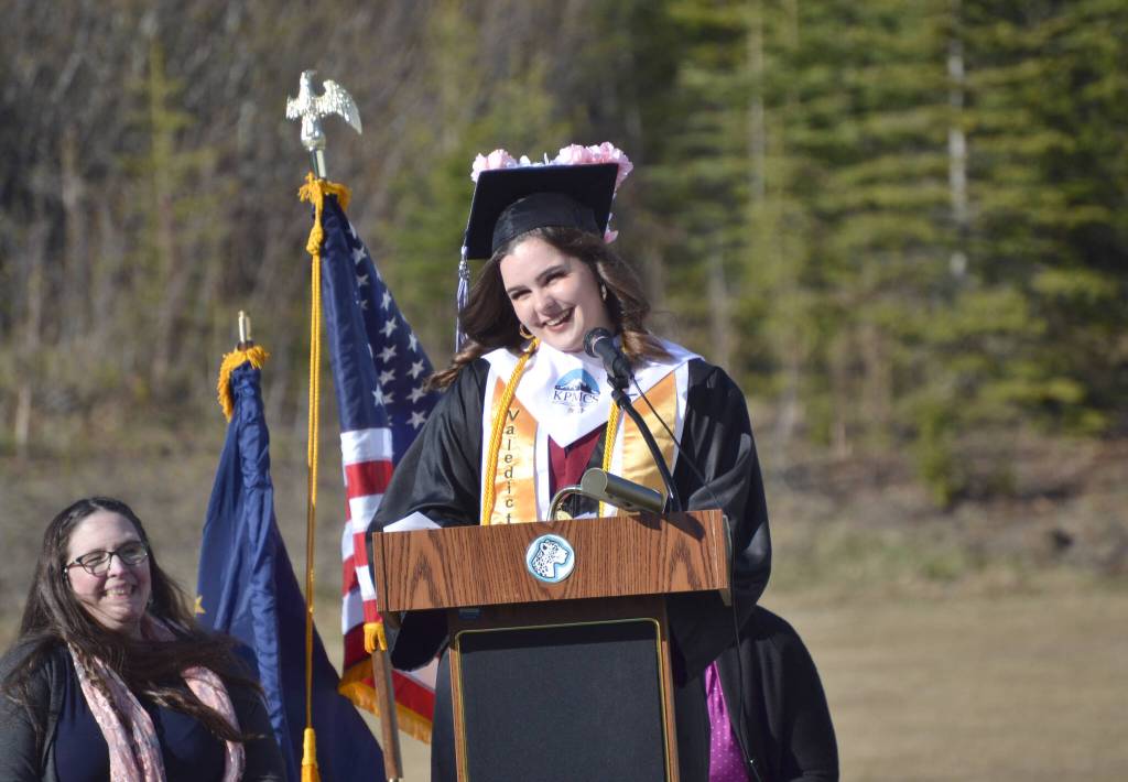 Evelyn Wilcox, valedictorian at River City Academy, speaks during graduation ceremonies Tuesday, May 17, 2022, outside Skyview Middle School just outside of Soldotna, Alaska. (Photo by Jeff Helminiak/Peninsula Clarion)