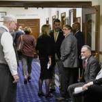 Lawmakers from both bodies of the Alaska State Legislature mingle in the halls of the Alaska State Capitol on Wednesday, May 18, 2022, the last day of the legislative session, following the Senates passing of the states budget bill. (Peter Segall / Juneau Empire)