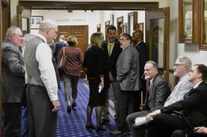 Lawmakers from both bodies of the Alaska State Legislature mingle in the halls of the Alaska State Capitol on Wednesday, May 18, 2022, the last day of the legislative session, following the Senates passing of the states budget bill. (Peter Segall / Juneau Empire)