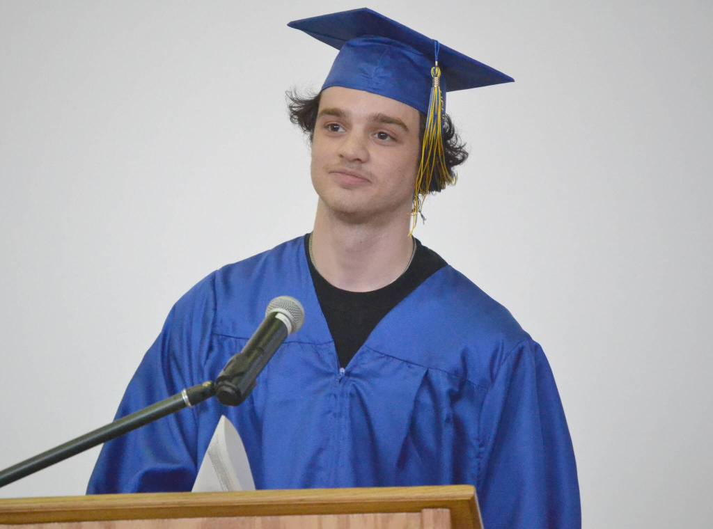 Corvin Bookey speaks at Kenai Alternative High Schools graduation Wednesday, May 18, 2022, at Kenai Alternative High School in Kenai, Alaska. (Photo by Jeff Helminiak/Peninsula Clarion)