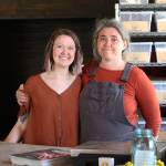 Anastasia Scollon (left) and Willow King (right) stand in The Goods + Sustainable Grocery and Where its At mindful food and drink on Monday, May 16, 2022 in Soldotna, Alaska. (Ashlyn OHara/Peninsula Clarion)