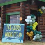 Signage marks the entrance of The Goods + Sustainable Grocery and Where its At mindful food and drink on Monday, May 16, 2022 in Soldotna, Alaska. (Ashlyn OHara/Peninsula Clarion)