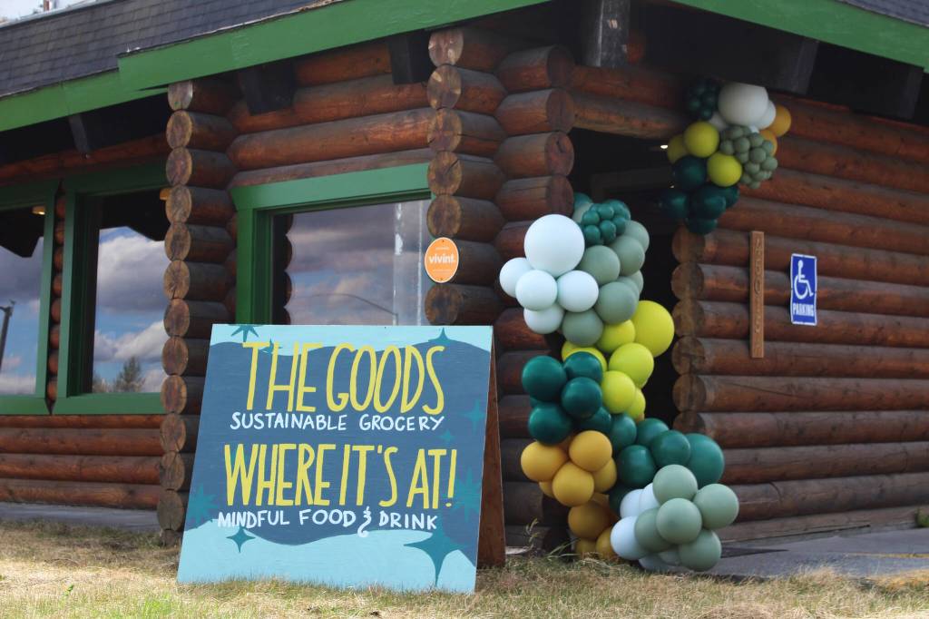 Signage marks the entrance of The Goods + Sustainable Grocery and Where its At mindful food and drink on Monday, May 16, 2022 in Soldotna, Alaska. (Ashlyn OHara/Peninsula Clarion)