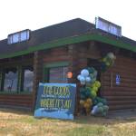 A sign marks the entrance of The Goods + Sustainable Grocery and Where its At mindful food and drink on Monday, May 16, 2022 in Soldotna, Alaska. (Ashlyn OHara/Peninsula Clarion)