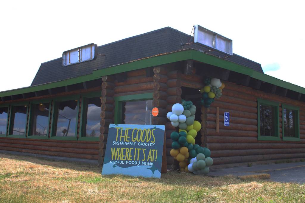 A sign marks the entrance of The Goods + Sustainable Grocery and Where its At mindful food and drink on Monday, May 16, 2022 in Soldotna, Alaska. (Ashlyn OHara/Peninsula Clarion)