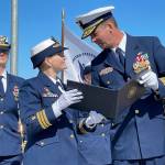 At the May 19, 2022, change of command ceremony in Homer, Alaska, Commander Jeannette Greene, outgoing captain of the USCGC Hickory (left) is presented with the Coast Guard Commendation Medal by Rear Admiral Nathan A. Moore, Seventeenth District Commander, United States Coast Guard. (Photo by McKibben Jackinsky)