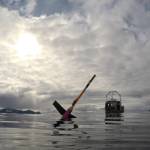 This April 28, 2022, photo provided by Andrew McDonnell shows an underwater glider waiting to be picked up in the Gulf of Alaska by the University of Alaska Fairbanks research vessel Nanuq. The glider was fitted with a special sensor that will collect an enormous amount of data to study ocean acidification. (Andrew McDonnell via AP)