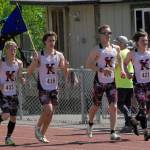 Kenai Centrals James Sparks, Jacob Begich, Tyler Hippchen and Reagan Graves celebrate after winning the 400-meter relay Saturday, May 28, 2022, at the Division II state track and field meet at Dimond High School in Anchorage, Alaska. (Photo by Jeff Helminiak/Peninsula Clarion)