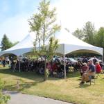 Community members gather at Leif Hansen Memorial Park in Kenai, Alaska, on Monday, May 30, 2022, to commemorate Memorial Day. (Camille Botello/Peninsula Clarion)